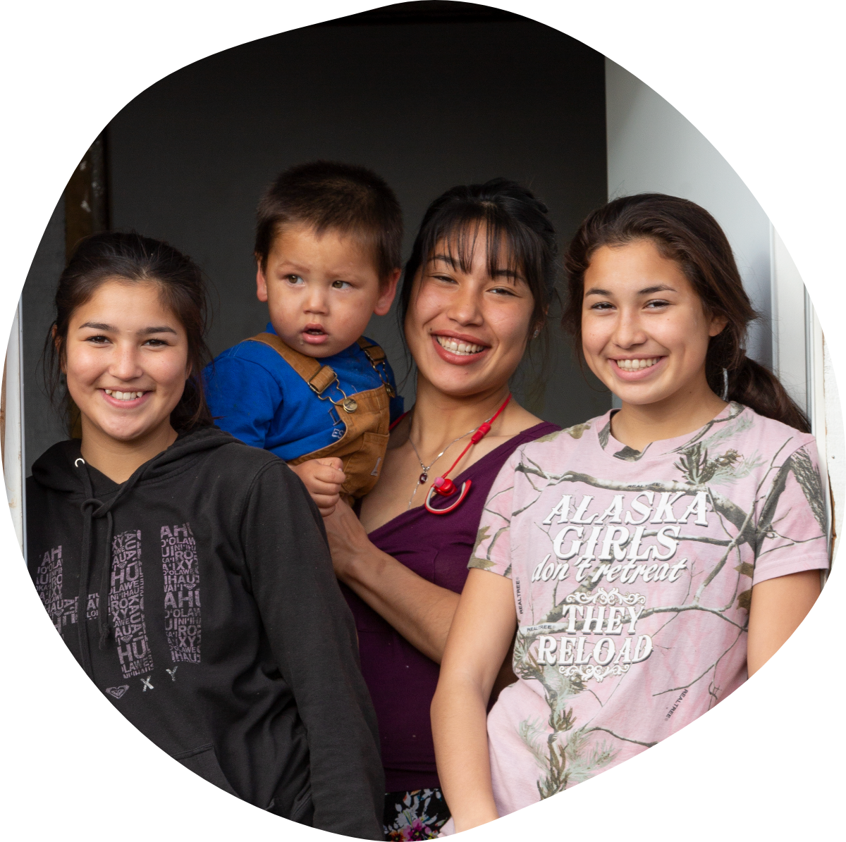 Iñupiat woman with three children